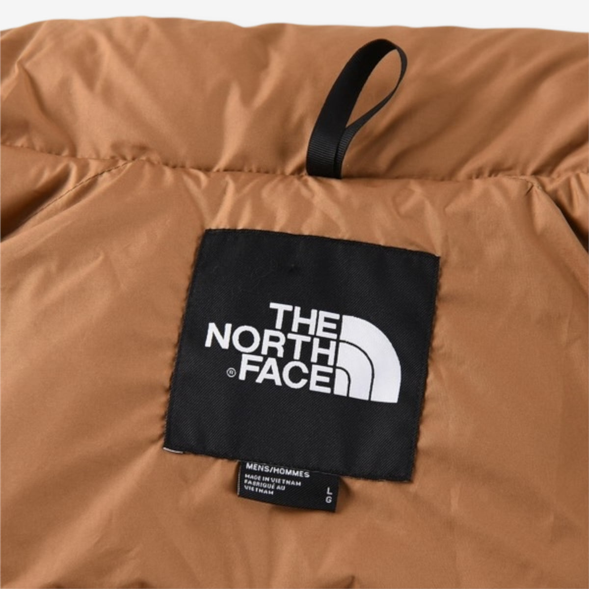 The North Face 1996 Retro Nuptse Jacket – Beige with light brown upper panel.