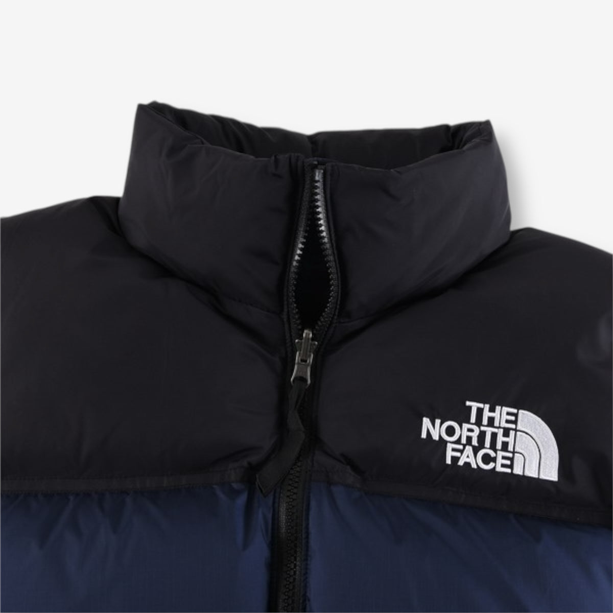 The North Face 1996 Retro Nuptse Jacket – Navy blue with black upper panel