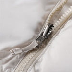 The North Face 1996 Retro Nuptse Jacket – Off-white/cream with light beige upper panel