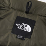 The North Face 1996 Retro Nuptse Jacket – Olive green with dark olive upper panel.