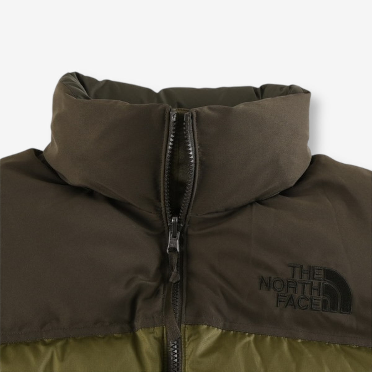 The North Face 1996 Retro Nuptse Jacket – Olive green with dark olive upper panel.