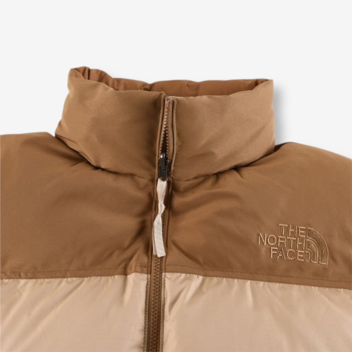 The North Face 1996 Retro Nuptse Jacket – Beige with light brown upper panel.