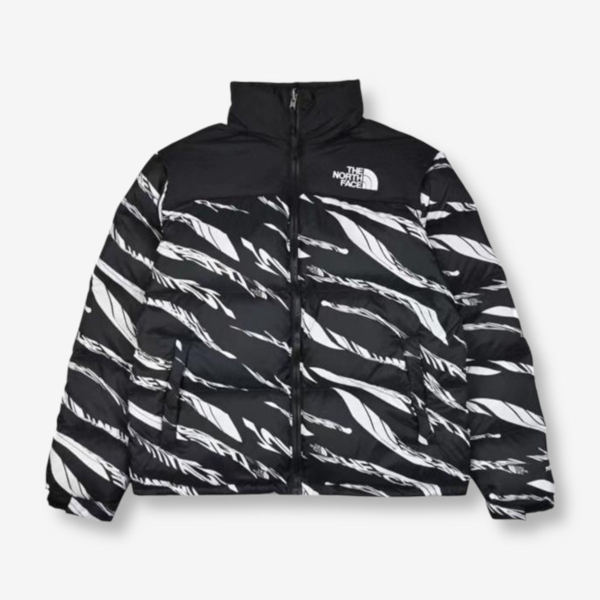 The North Face x KAWS Retro 1996 Nuptse Jacket – Black with white abstract KAWS pattern