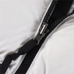 The North Face 1996 Retro Nuptse Jacket – White with black upper panel.